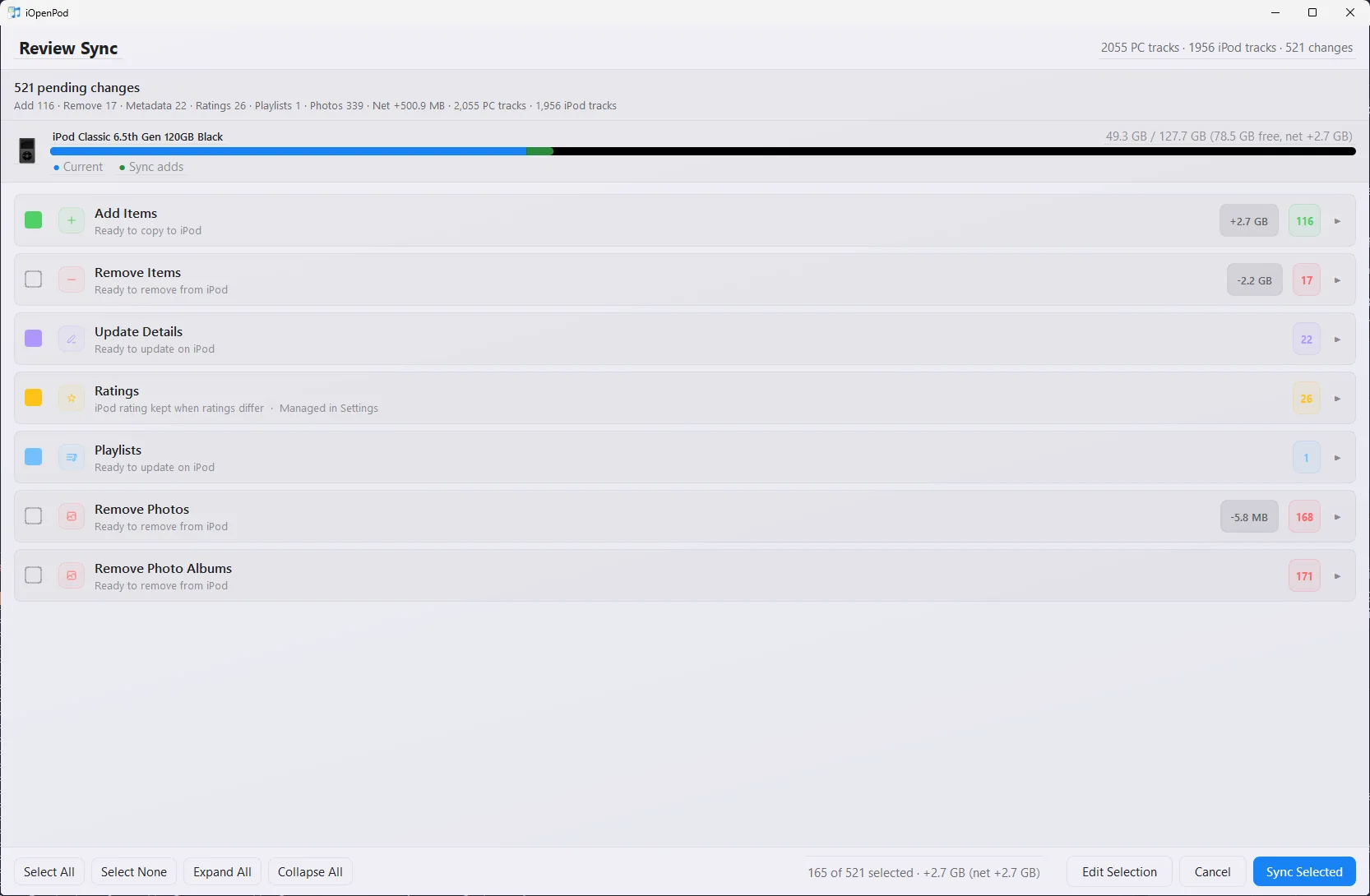 iOpenPod sync review summarizing additions, removals, metadata, ratings, playlists, photos, and storage impact